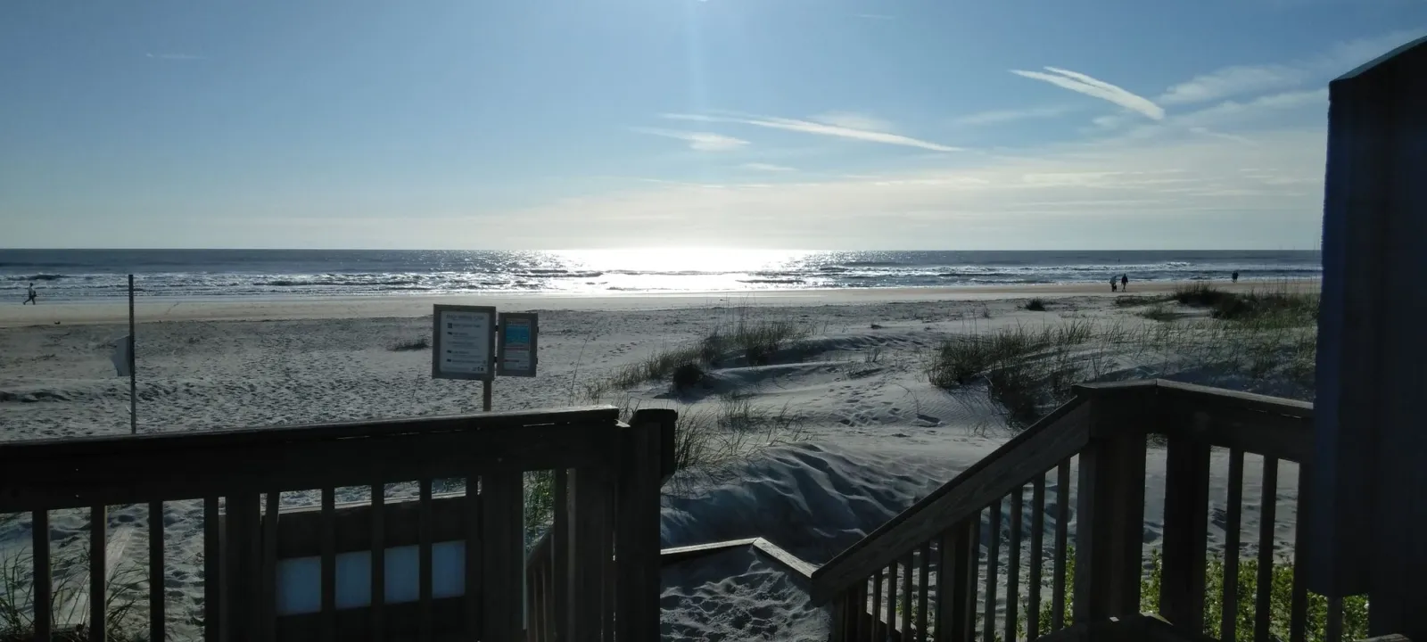 A beach access deck looking out over the ocean