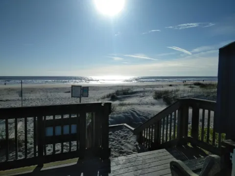 A beach access deck looking out over the ocean