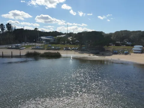 A calm lagoon edged with trees