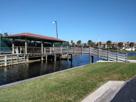 A covered dock on the water