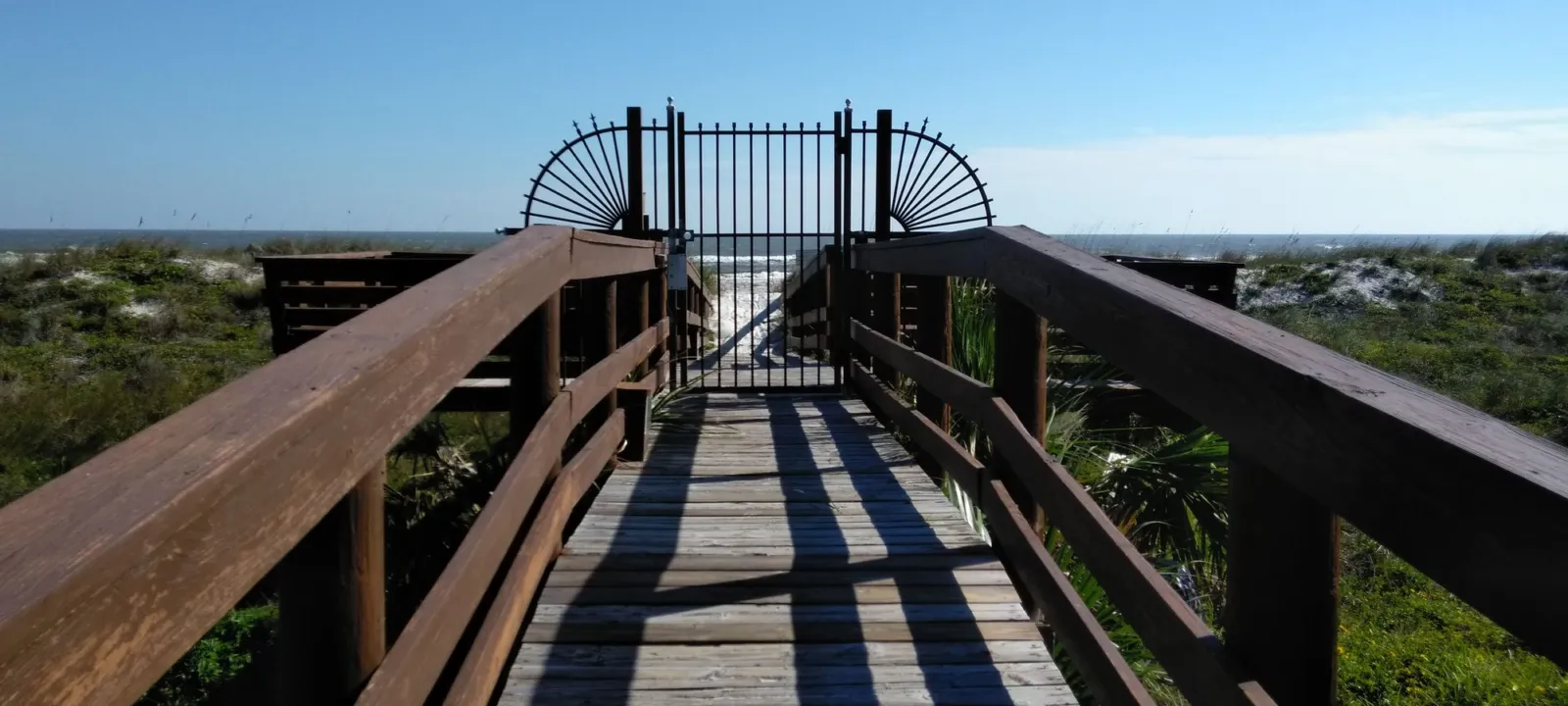 A wooden walkover leading to the beach
