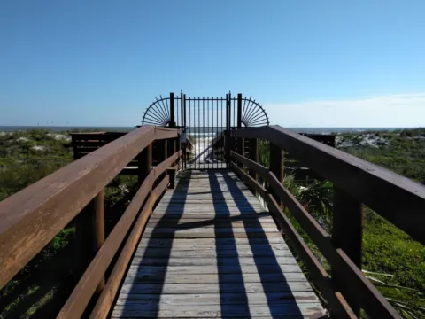 A wooden walkover leading to the beach