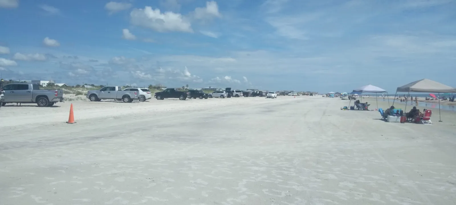 Cars parked on a hard-packed Florida beach