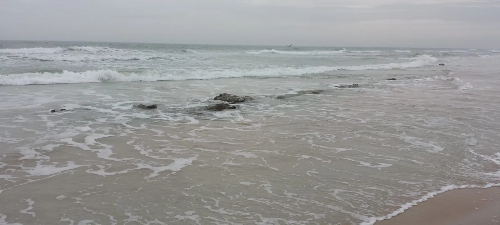 Gentle surf on a quiet beach