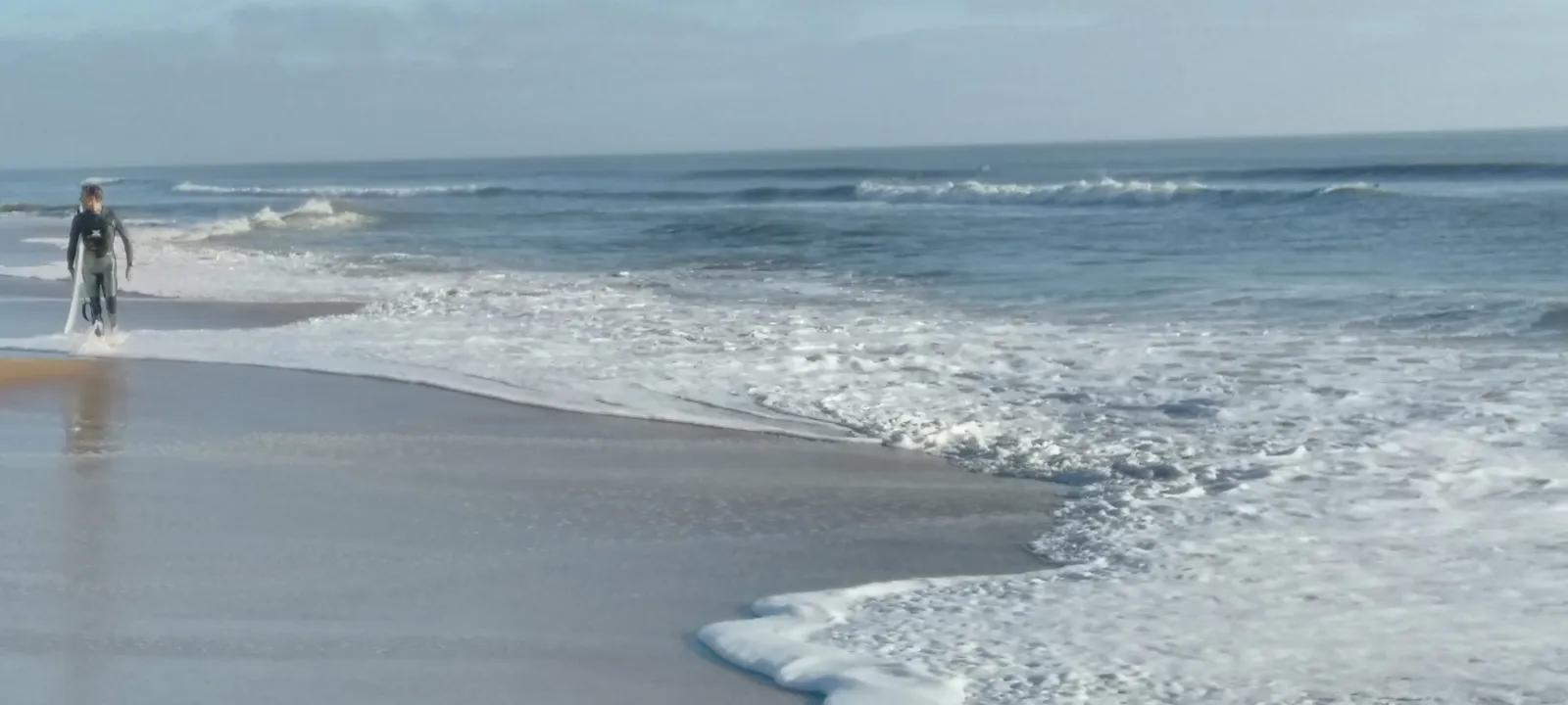 Surf rolling up a quiet Florida beach