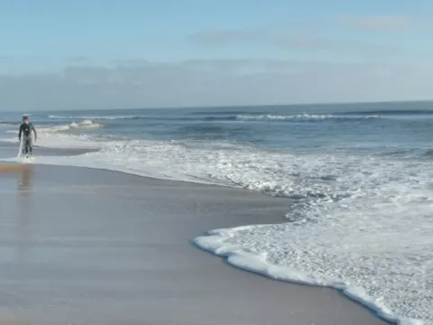 Surf rolling up a quiet Florida beach