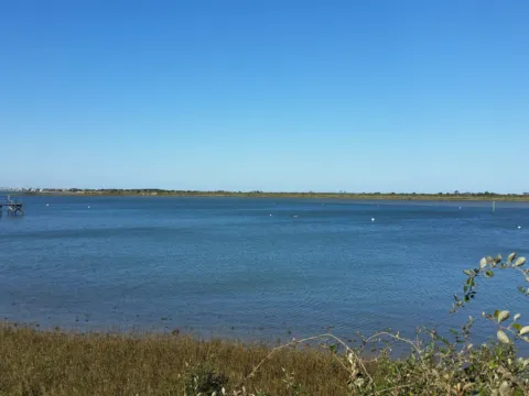 Wide view across calm Intracoastal water on a clear day