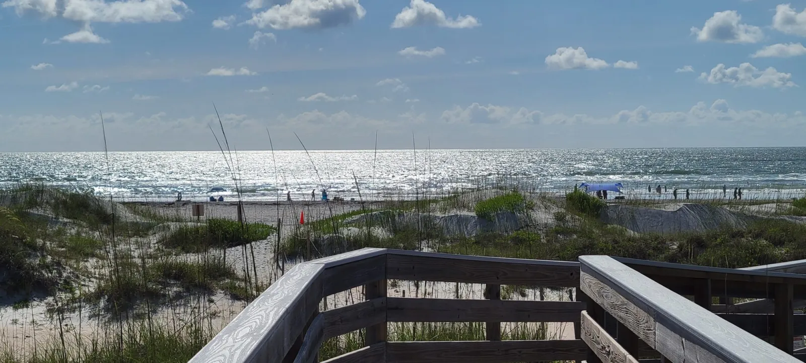 Wooden boardwalk overlook above the dunes and the Atlantic